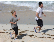 Hillary Duff photos jogging Caribbean Beach 23 January 2009